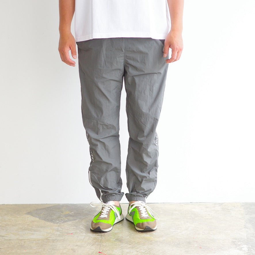 ANORAK CLUB  -LET'S STOP DREAMING-  NYLON TRACK PANTS  アノラッククラブ