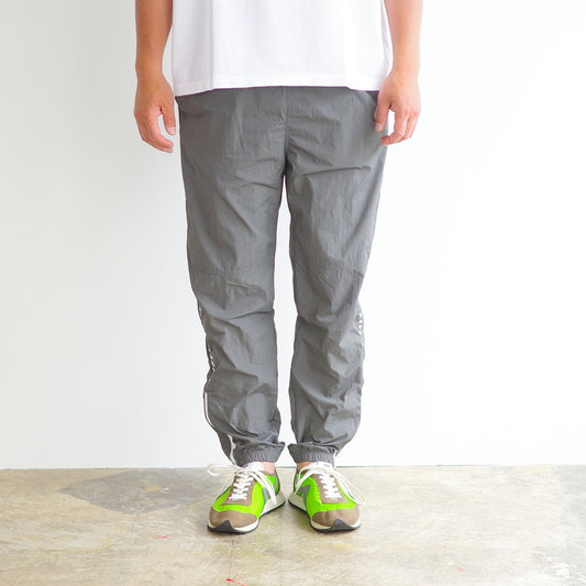 ANORAK CLUB  -LET'S STOP DREAMING-  NYLON TRACK PANTS  アノラッククラブ
