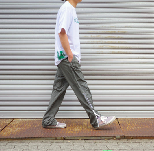 ANORAK SPORTS CLUB  -LET'S STOP DREAMING-  NYLON TRACK PANTS  アノラッククラブ